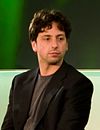 https://upload.wikimedia.org/wikipedia/commons/thumb/a/a2/Sergey_Brin_cropped.jpg/100px-Sergey_Brin_cropped.jpg